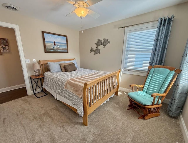 bedroom featuring carpet flooring, baseboards, and a ceiling fan