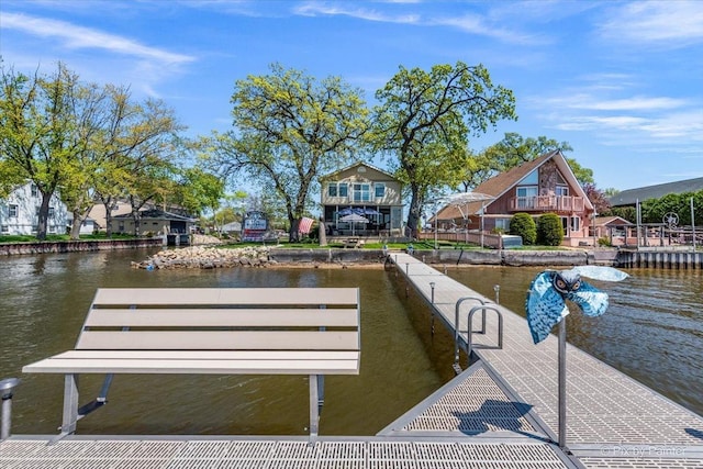 dock area with a water view
