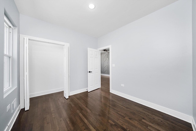 7414 S Aberdeen St, Chicago, IL 60621 - unfurnished bedroom with wood finished floors, baseboards, recessed lighting, and a closet