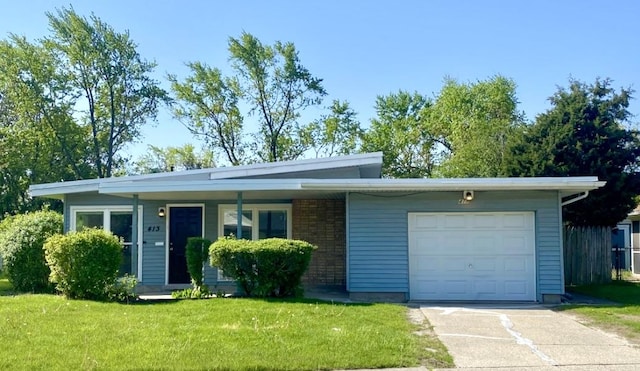 413 Wilshire St, Park Forest, IL 60466 - view of front of home featuring an attached garage, a front lawn, and driveway