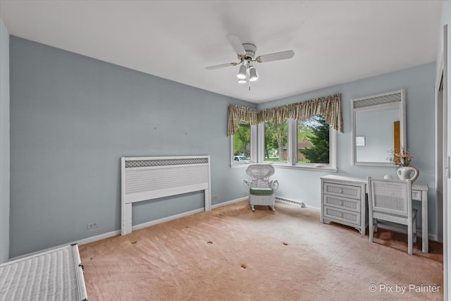 bedroom featuring carpet flooring, a baseboard heating unit, baseboards, and ceiling fan