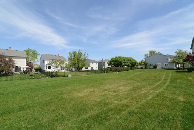 view of yard featuring a residential view