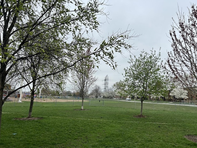 view of property's community with fence