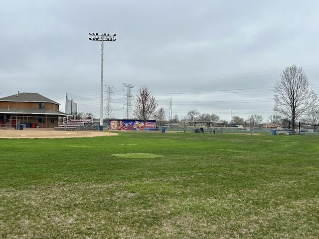 view of home's community with a yard