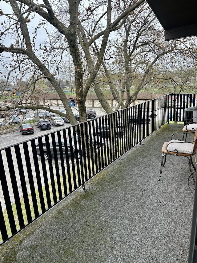 view of patio featuring a balcony