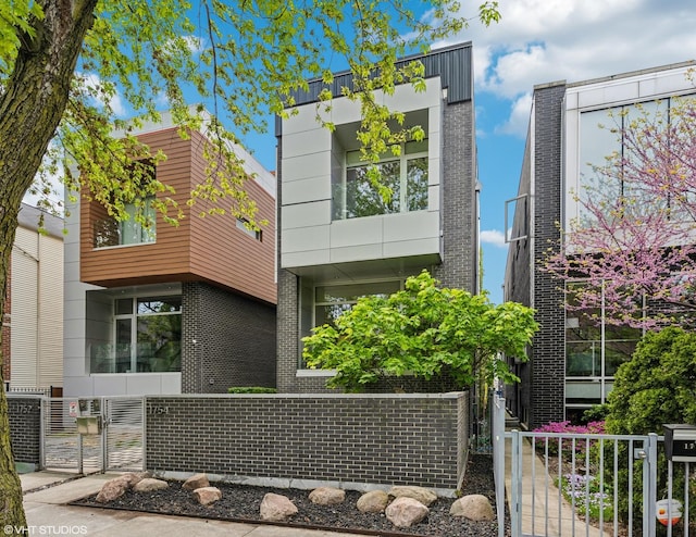 1754 N Rockwell St, Chicago, IL 60647 - view of front of home with brick siding and fence