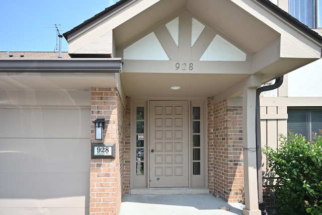 928 Surrey Dr Unit 1A, Schaumburg, IL 60193 - view of exterior entry with brick siding