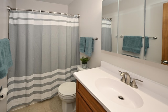 928 Surrey Dr Unit 1A, Schaumburg, IL 60193 - bathroom with vanity, tile patterned floors, and a shower with shower curtain