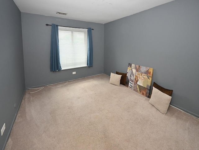 928 Surrey Dr Unit 1A, Schaumburg, IL 60193 - carpeted spare room featuring baseboards