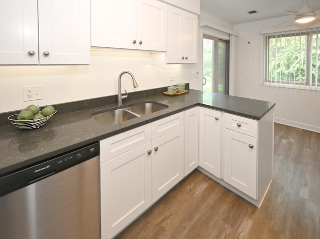 928 Surrey Dr Unit 1A, Schaumburg, IL 60193 - kitchen with dishwasher, a peninsula, dark wood finished floors, white cabinets, and a ceiling fan