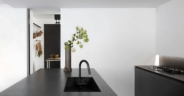 3845 S Winchester Ave, Chicago, IL 60609 - kitchen featuring a sink and dark countertops