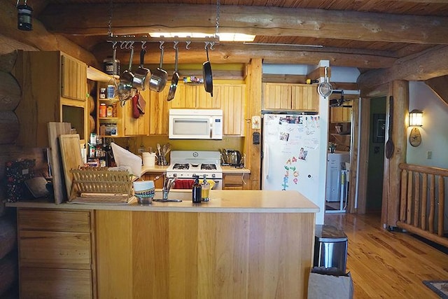 3526 E 2179th Rd, Ottawa, IL 61350 - kitchen featuring white appliances, light wood-type flooring, beam ceiling, light countertops, and a peninsula
