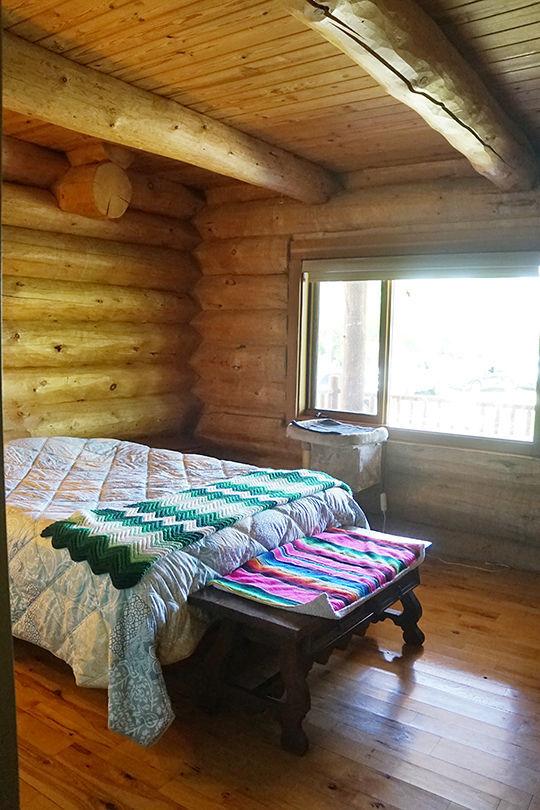 3526 E 2179th Rd, Ottawa, IL 61350 - bedroom featuring rustic walls, wood ceiling, wood-type flooring, and beam ceiling