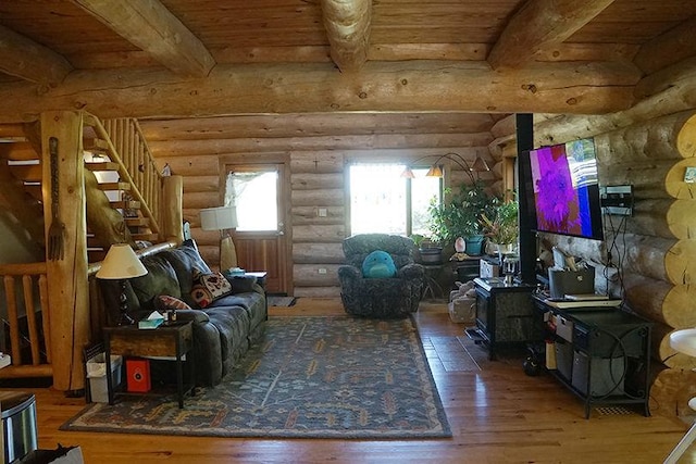 3526 E 2179th Rd, Ottawa, IL 61350 - living area featuring wood finished floors, stairs, log walls, wood ceiling, and beam ceiling