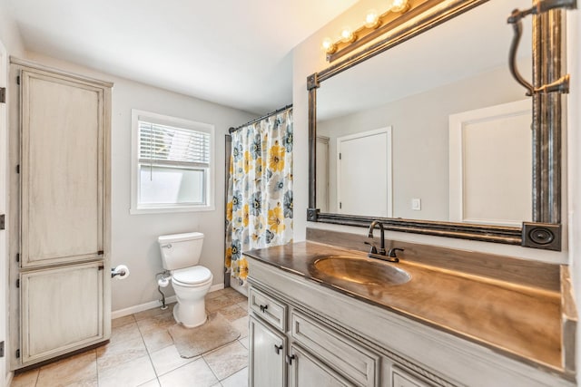 2124 Northwood Dr, Belvidere, IL 61008 - bathroom with toilet, vanity, tile patterned flooring, and baseboards
