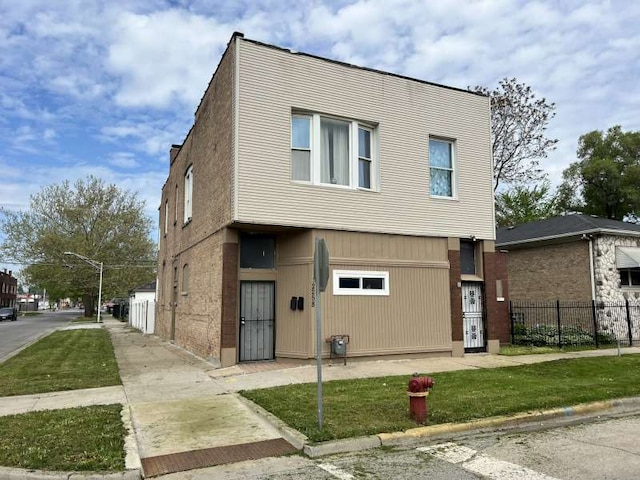 12256 S Union Ave, Chicago, IL 60628 - view of front facade featuring fence