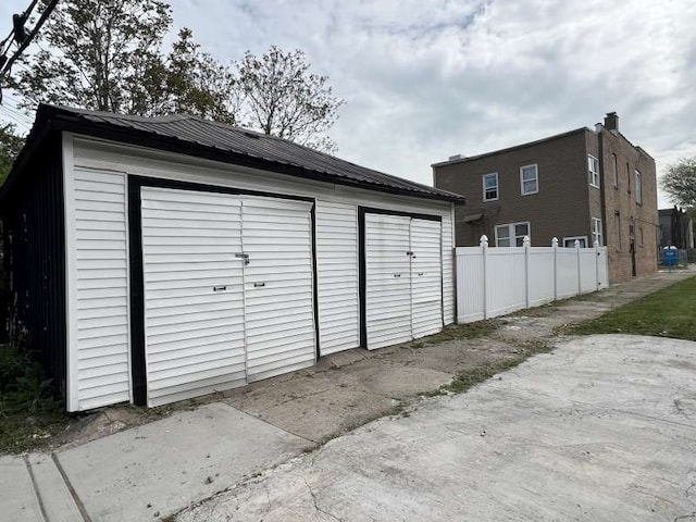 12256 S Union Ave, Chicago, IL 60628 - view of outdoor structure with fence and an outbuilding