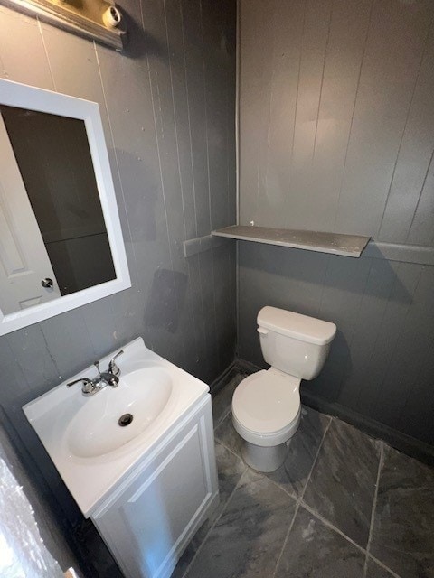 12256 S Union Ave, Chicago, IL 60628 - half bath with toilet, vanity, and marble look tiles