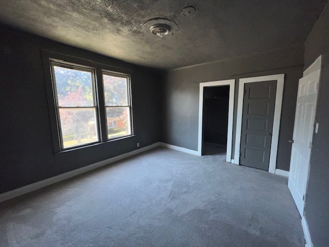 12256 S Union Ave, Chicago, IL 60628 - unfurnished bedroom with carpet floors and baseboards