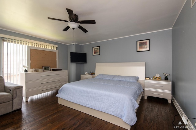 bedroom featuring dark wood finished floors, baseboards, and ceiling fan