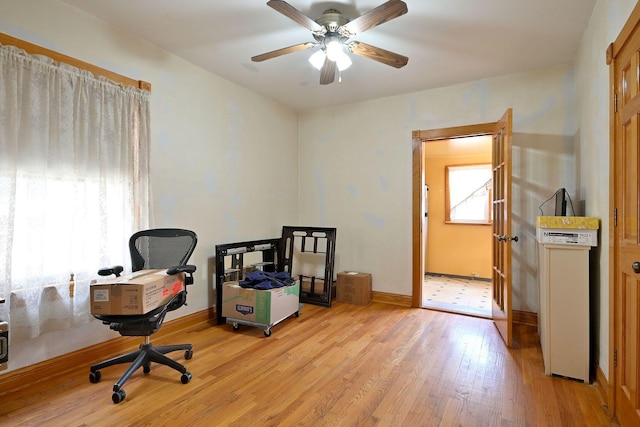 3113 N Major Ave, Chicago, IL 60634 - office area with light wood finished floors, ceiling fan, and baseboards