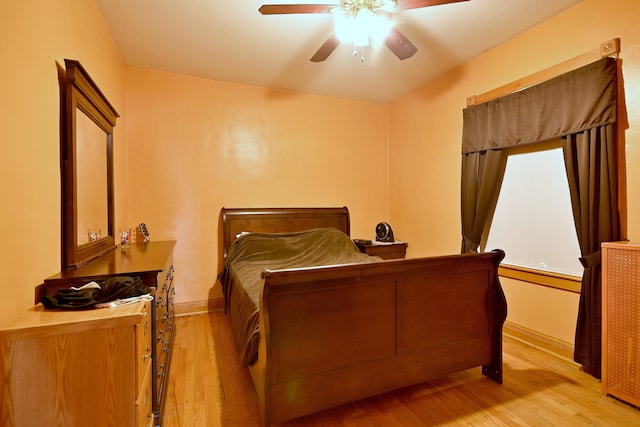 3113 N Major Ave, Chicago, IL 60634 - bedroom featuring light wood-style floors, baseboards, and a ceiling fan