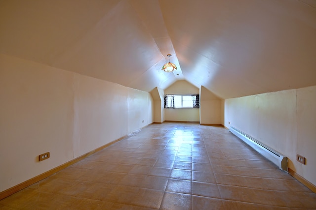 3113 N Major Ave, Chicago, IL 60634 - additional living space featuring a baseboard heating unit, vaulted ceiling, and baseboards