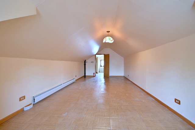3113 N Major Ave, Chicago, IL 60634 - additional living space with baseboard heating, lofted ceiling, and baseboards