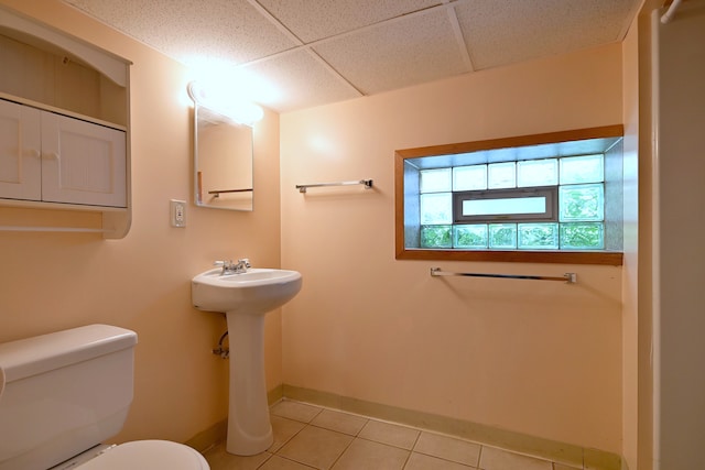 3113 N Major Ave, Chicago, IL 60634 - bathroom with tile patterned flooring, toilet, baseboards, and a paneled ceiling