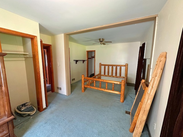 925 N Otter Creek Rd, Streator, IL 61364 - carpeted bedroom with a closet and a ceiling fan