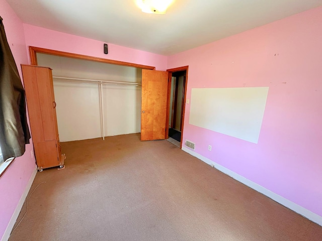 925 N Otter Creek Rd, Streator, IL 61364 - unfurnished bedroom with a closet, carpet flooring, and baseboards