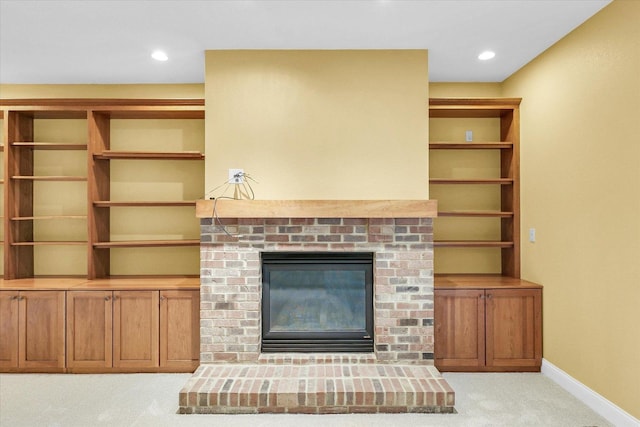 4410 Southford Trace Dr, Champaign, IL 61822 - unfurnished living room featuring light colored carpet, a fireplace, baseboards, and recessed lighting