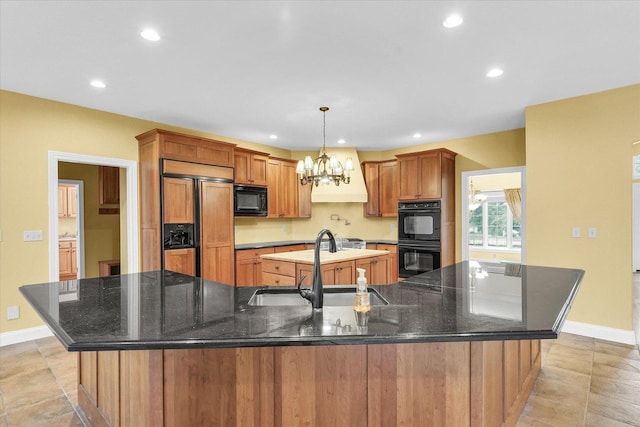 4410 Southford Trace Dr, Champaign, IL 61822 - kitchen with black appliances, a spacious island, a sink, baseboards, and recessed lighting