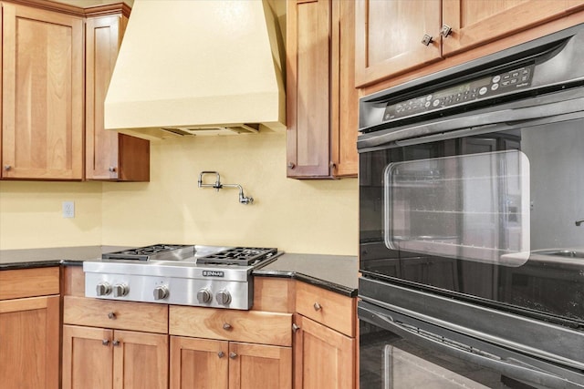 4410 Southford Trace Dr, Champaign, IL 61822 - kitchen featuring custom range hood, stainless steel gas cooktop, and dark countertops