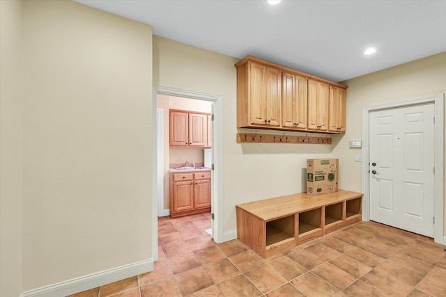 4410 Southford Trace Dr, Champaign, IL 61822 - mudroom with recessed lighting, baseboards, and a sink