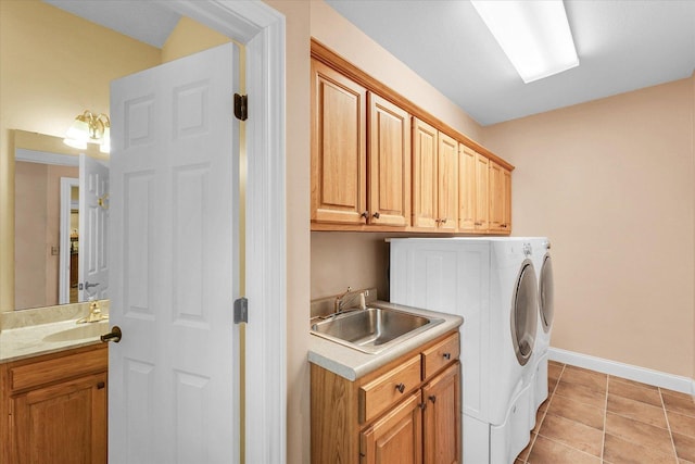 4410 Southford Trace Dr, Champaign, IL 61822 - laundry room with washing machine and dryer, baseboards, light tile patterned floors, and cabinet space
