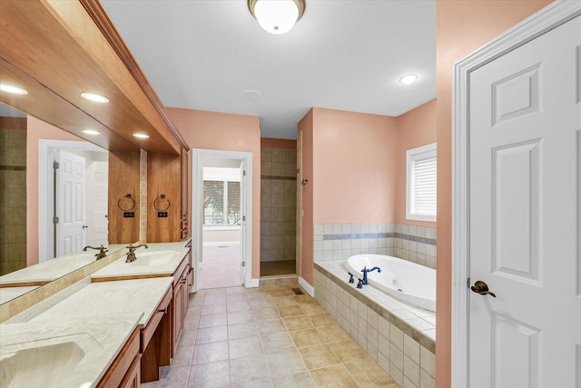 4410 Southford Trace Dr, Champaign, IL 61822 - full bathroom featuring double vanity, a tub with jets, a stall shower, tile patterned floors, and recessed lighting