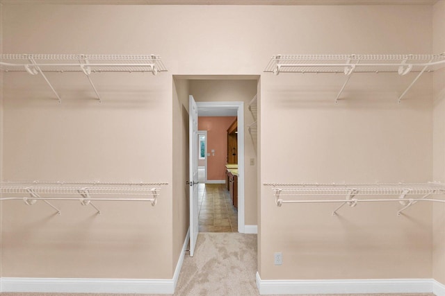 4410 Southford Trace Dr, Champaign, IL 61822 - walk in closet featuring carpet flooring