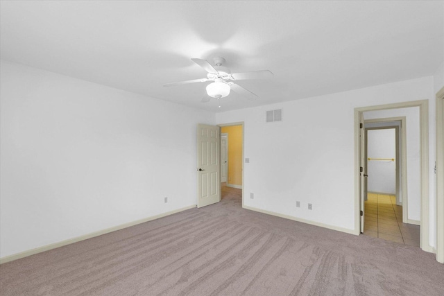 4410 Southford Trace Dr, Champaign, IL 61822 - unfurnished bedroom featuring carpet floors, baseboards, and a ceiling fan