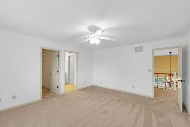 4410 Southford Trace Dr, Champaign, IL 61822 - unfurnished bedroom with light carpet, baseboards, a chandelier, and ceiling fan