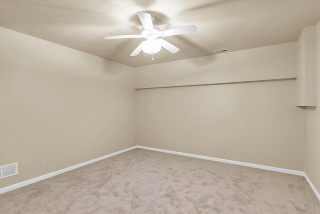 4410 Southford Trace Dr, Champaign, IL 61822 - spare room with light carpet, baseboards, and ceiling fan