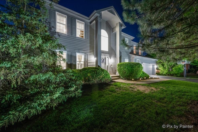 9 Laurel Valley Ct, Lake In The Hills, IL 60156 - view of front of property featuring a yard, asphalt driveway, and an attached garage
