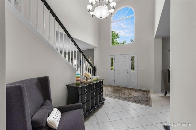 9 Laurel Valley Ct, Lake In The Hills, IL 60156 - foyer featuring stairway, a chandelier, a towering ceiling, and light tile patterned floors