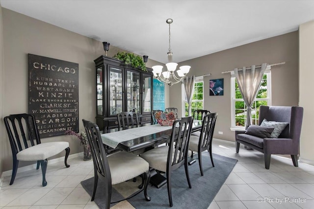 9 Laurel Valley Ct, Lake In The Hills, IL 60156 - dining area with a chandelier and light tile patterned floors