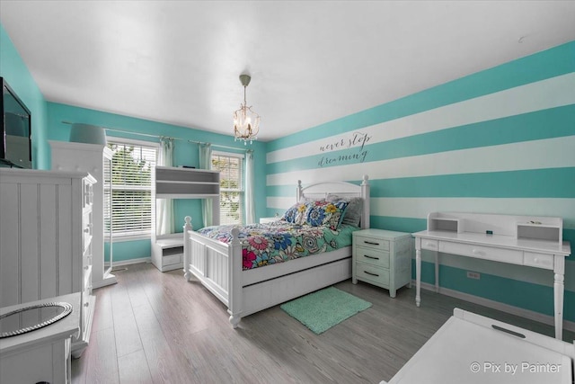 9 Laurel Valley Ct, Lake In The Hills, IL 60156 - bedroom with a chandelier and wood finished floors