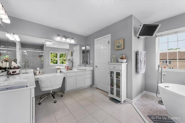 9 Laurel Valley Ct, Lake In The Hills, IL 60156 - bathroom with vanity, a shower stall, a freestanding tub, and tile patterned flooring