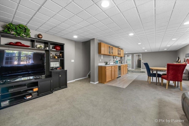 9 Laurel Valley Ct, Lake In The Hills, IL 60156 - living room featuring wet bar, light colored carpet, beverage cooler, and recessed lighting