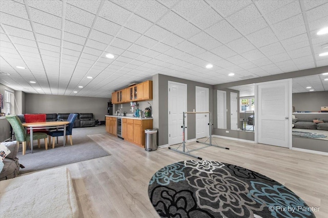 9 Laurel Valley Ct, Lake In The Hills, IL 60156 - living area with wine cooler, light wood-style flooring, bar area, and recessed lighting