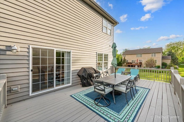 9 Laurel Valley Ct, Lake In The Hills, IL 60156 - wooden deck featuring outdoor dining area and a grill