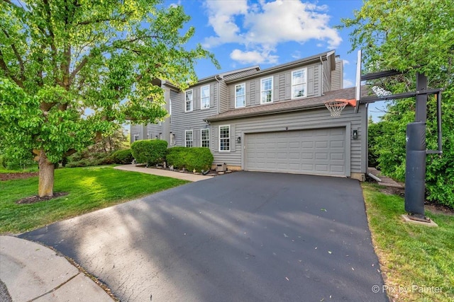 9 Laurel Valley Ct, Lake In The Hills, IL 60156 - view of front of house with driveway, a garage, and a front yard